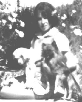 Denise Leo as a child and her Pomeranian