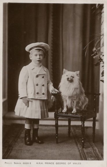 H.R.H. Prince George of Wales and a Pomeranian